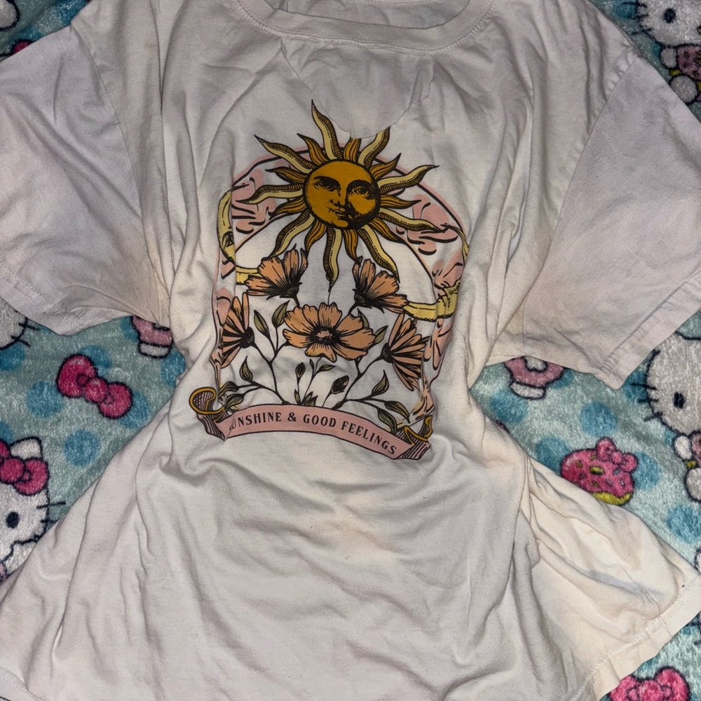 White Graphic Tee with Sun and Floral Design